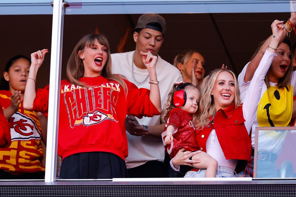 Taylor Swift and Brittany Mahomes celebrate a touchdown during the second quarter of the game between the Kansas City Chiefs and the Los Angeles Chargers at GEHA Field at Arrowhead Stadium on October 22, 2023 in Kansas City, Missouri.