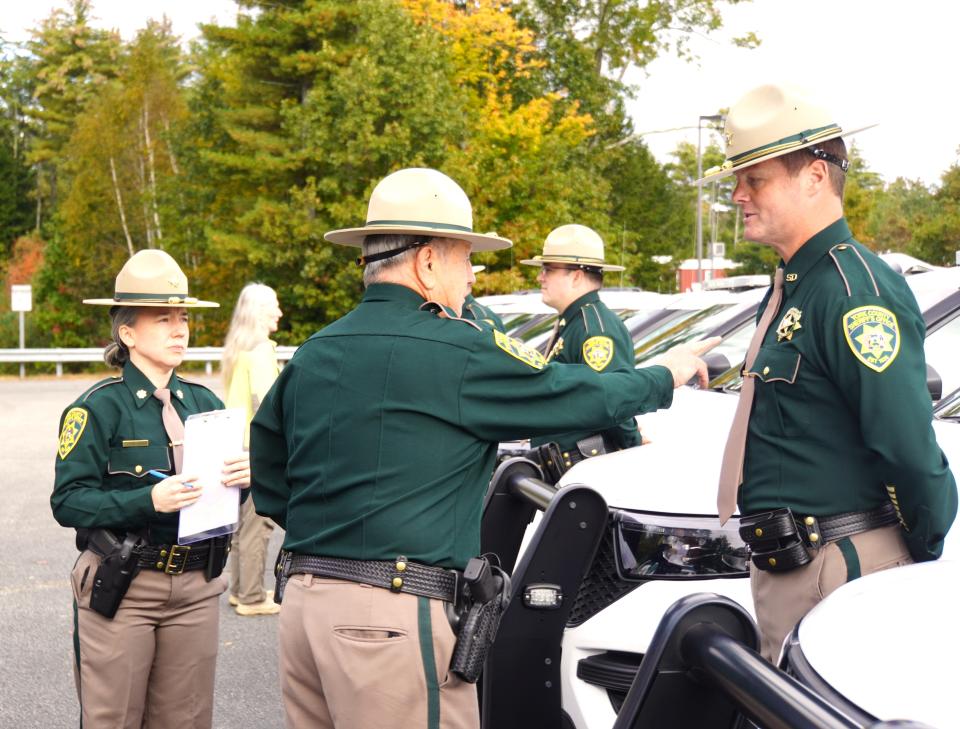 York County Sheriff William L. King, accompanied by Major Kathyrn L. Mone speaks with Deputy Scott Corey during the sheriff’s office annual inspection on Tuesday, Oct. 17.