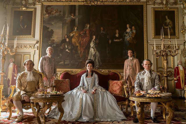 Liam Daniel/Netflix Left to right (bottom row): Neil Edmond as Earl Harcourt, Michelle Fairley as Princess Augusta and Richard Cunningham as Lord Bute in Netflix's 'Queen Charlotte: A Bridgerton Story'