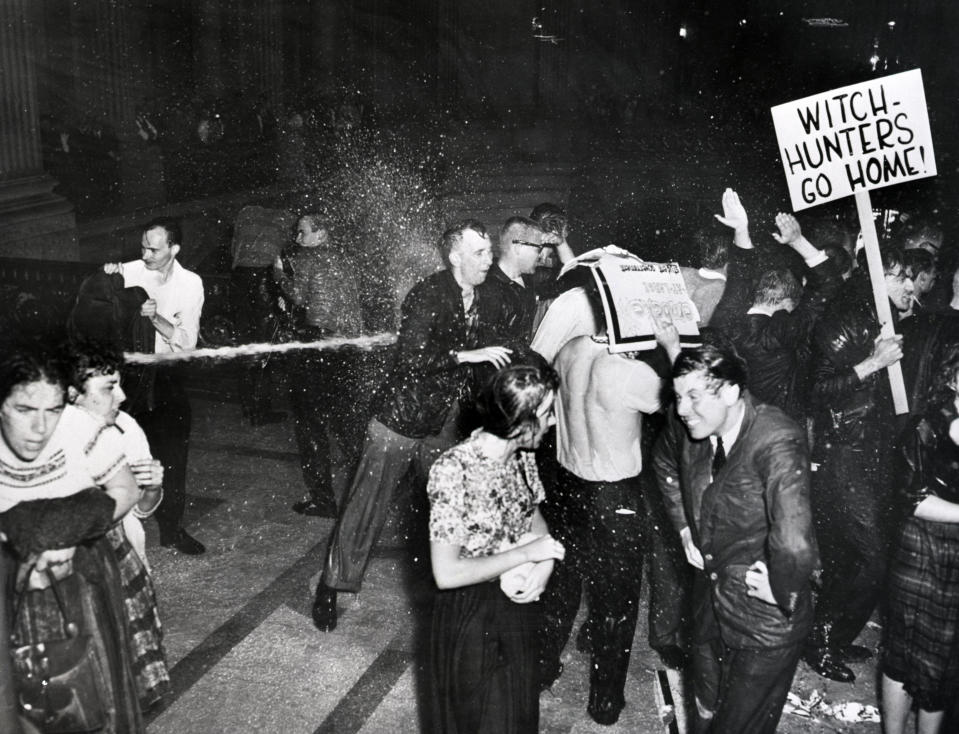 Police hose demonstrators in San Francisco's city hall who are protesting against the House Committee on Un-American Activities. The riot ended with police dragging the protesters from the building. May 13, 1960. (Photo: Bettmann Archive/Getty Images)