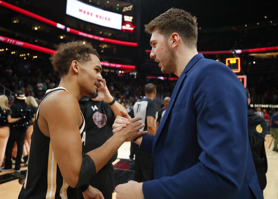 Trae Young and Luka Doncic will forever be linked by the 2018 NBA draft. (Todd Kirkland/Getty Images)