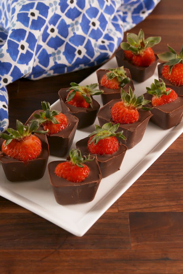 <p>The perfect chocolate to strawberry ratio. </p><p>Get the <a href="https://www.delish.com/uk/cooking/recipes/a33257445/chocolate-covered-strawberry-cubes-recipe/" rel="nofollow noopener" target="_blank" data-ylk="slk:Chocolate Covered Strawberry Cubes;elm:context_link;itc:0;sec:content-canvas" class="link ">Chocolate Covered Strawberry Cubes</a> recipe.</p>