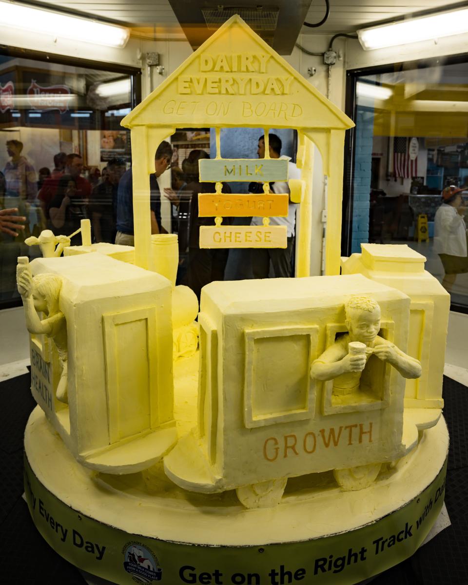 "Dairy Every Day is a Healthy Way - Keeping Kids' Health on Track" is the theme of the 55th Annual Butter Sculpture which was unveiled at the New York State Fairgrounds in Syracuse, NY on Tuesday, August 22, 2023. Sponsored by Wegmans, this year's sculpture highlights the important nutritional role dairy foods play in helping brains, bones and bodies grow.