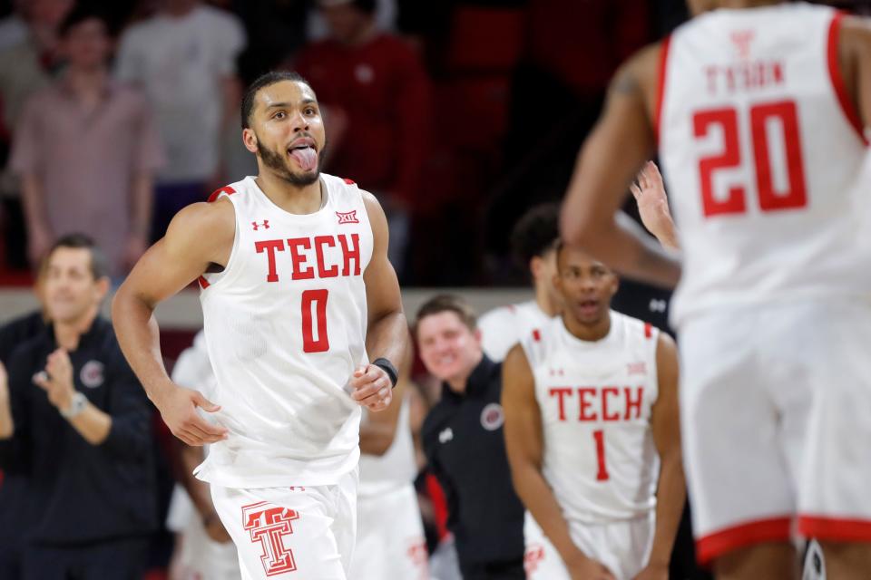 Texas Tech Red Raiders forward Kevin Obanor (0) celebrates during a men's college basketball game between the University of Oklahoma Sooners (OU) and Texas Tech at Lloyd Noble Center in Norman, Okla., Tuesday, Feb. 21, 2023. Texas Tech won 74-63.