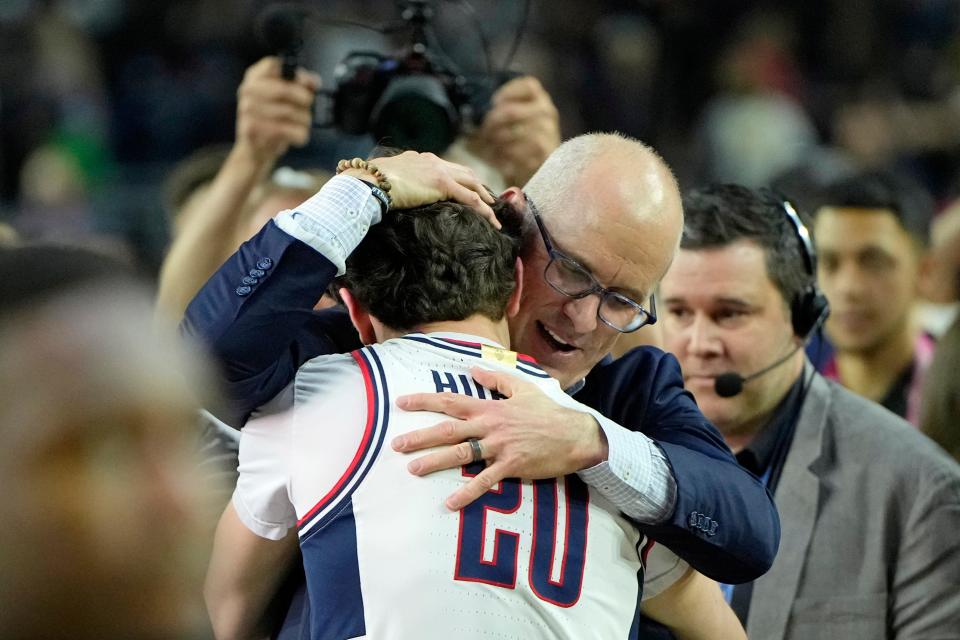 Apr 3, 2023; Houston, TX, USA; Connecticut Huskies head coach Dan Hurley hugs his son guard Andrew Hurley (20) after their win against the San Diego State Aztecs in the national championship game of the 2023 NCAA Tournament at NRG Stadium. Mandatory Credit: Bob Donnan-USA TODAY Sports