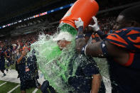 UTSA head coach Jeff Traylor, center, is doused by his players after the team's win over Western Kentucky in an NCAA college football game in the Conference USA Championship, Friday, Dec. 3, 2021, in San Antonio. (AP Photo/Eric Gay)