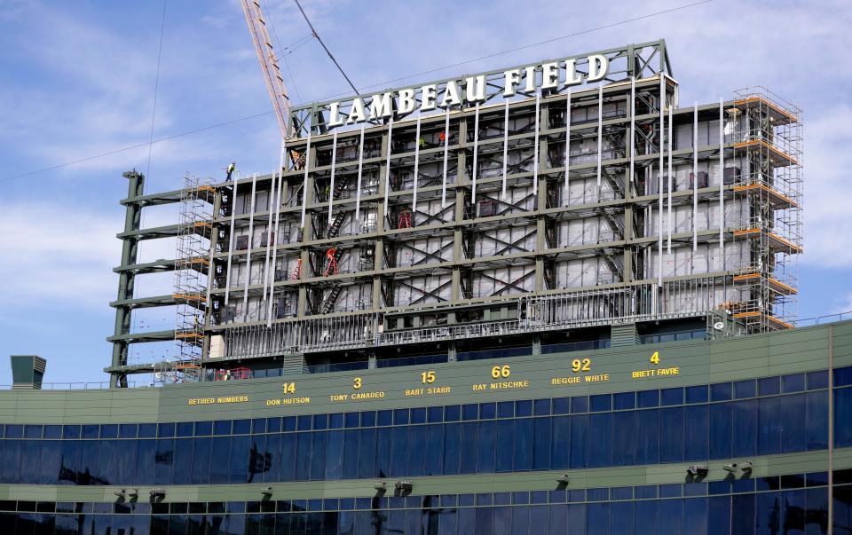 Construction crews work to expand the video boards at Lambeau Field on April 4, 2023, in Green Bay, Wis. A construction worker was fatally injured at the stadium June 15. Earlier this month, OSHA issued citations and proposed penalties against Mavid Construction and Miron Construction.