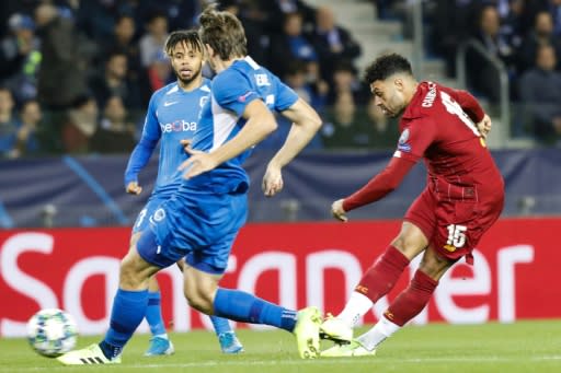 Alex Oxlade-Chamberlain scores one of his two goals in Liverpool's 4-1 win over Genk in Belgium