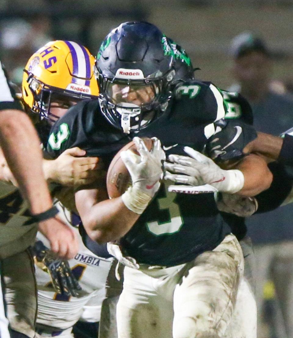 Cole Tabb carries the ball during the Choctaw Columbia regional quarterfinal playoff football game at Choctaw.