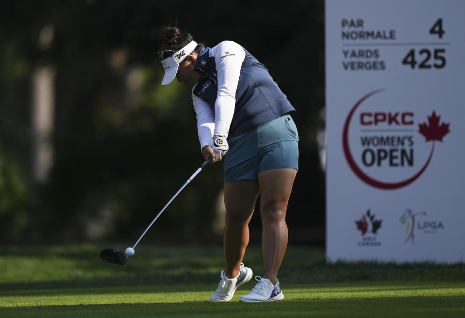 Megan Khang, of the United States, hits her tee shot on the 10th hole during the third round of the CPKC Women’s Open golf tournament Saturday, Aug. 26, 2023, in Vancouver, British Columbia. (Darryl Dyck/The Canadian Press via AP)