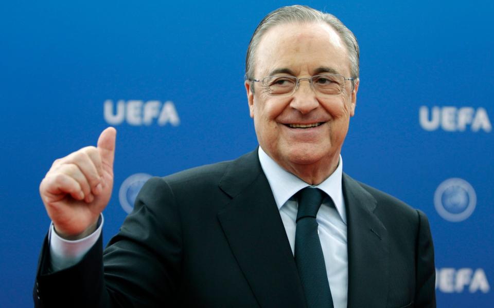 Madrid President Florentino Perez gives a thumbs up as he arrives for the UEFA Champions League draw at the Grimaldi Forum - AP