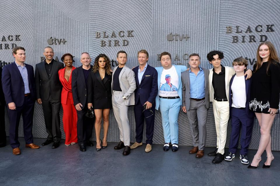 Joe Williamson, Christopher B. Duncan, Melanie Nicholls-King, Dennis Lehane, Sepideh Moafi, Taron Egerton, Greg Kinnear, Paul Walter Hauser, Cullen Moss, Braxton Alexander, Cade Tropeano and Karsen Liotta attend the Los Angeles premiere of Apple TV+'s new show "Black Bird"