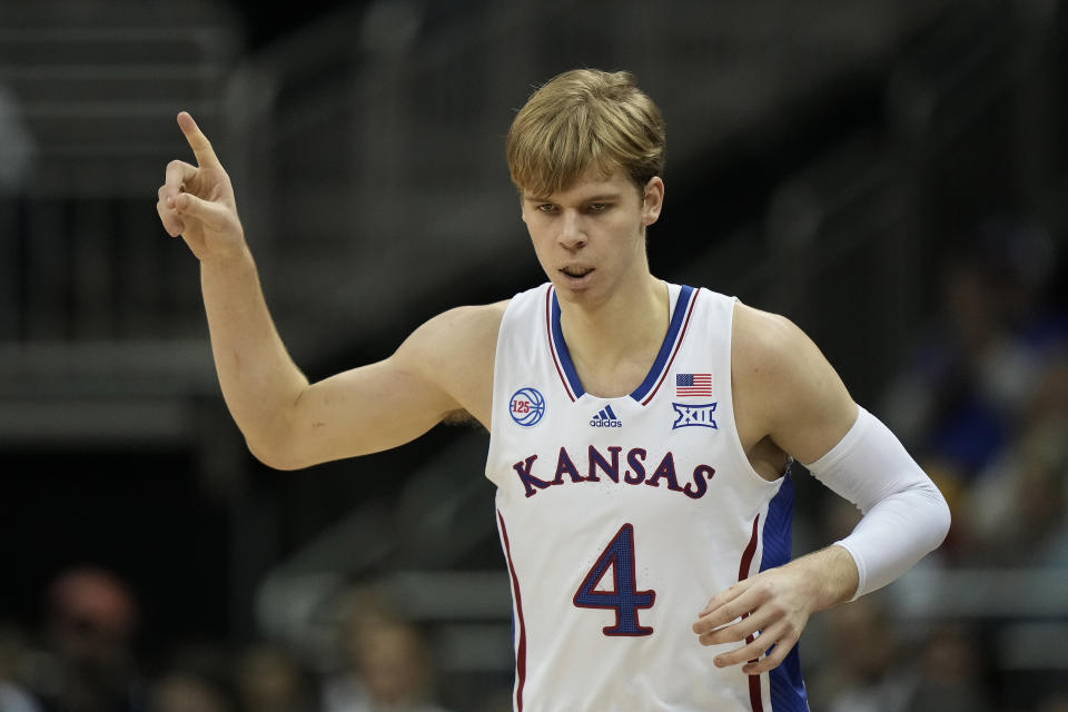 Kansas guard Gradey Dick celebrates after making a basket during the first half of an NCAA college basketball game against West Virginia in the second round of the Big 12 Conference tournament Thursday, March 9, 2023, in Kansas City, Mo. (AP Photo/Charlie Riedel)