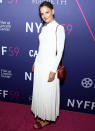 <p>Katie Holmes poses on the red carpet at the opening night screening of <em>The Tragedy of Macbeth </em>on Sept. 24 during the New York Film Festival.</p>