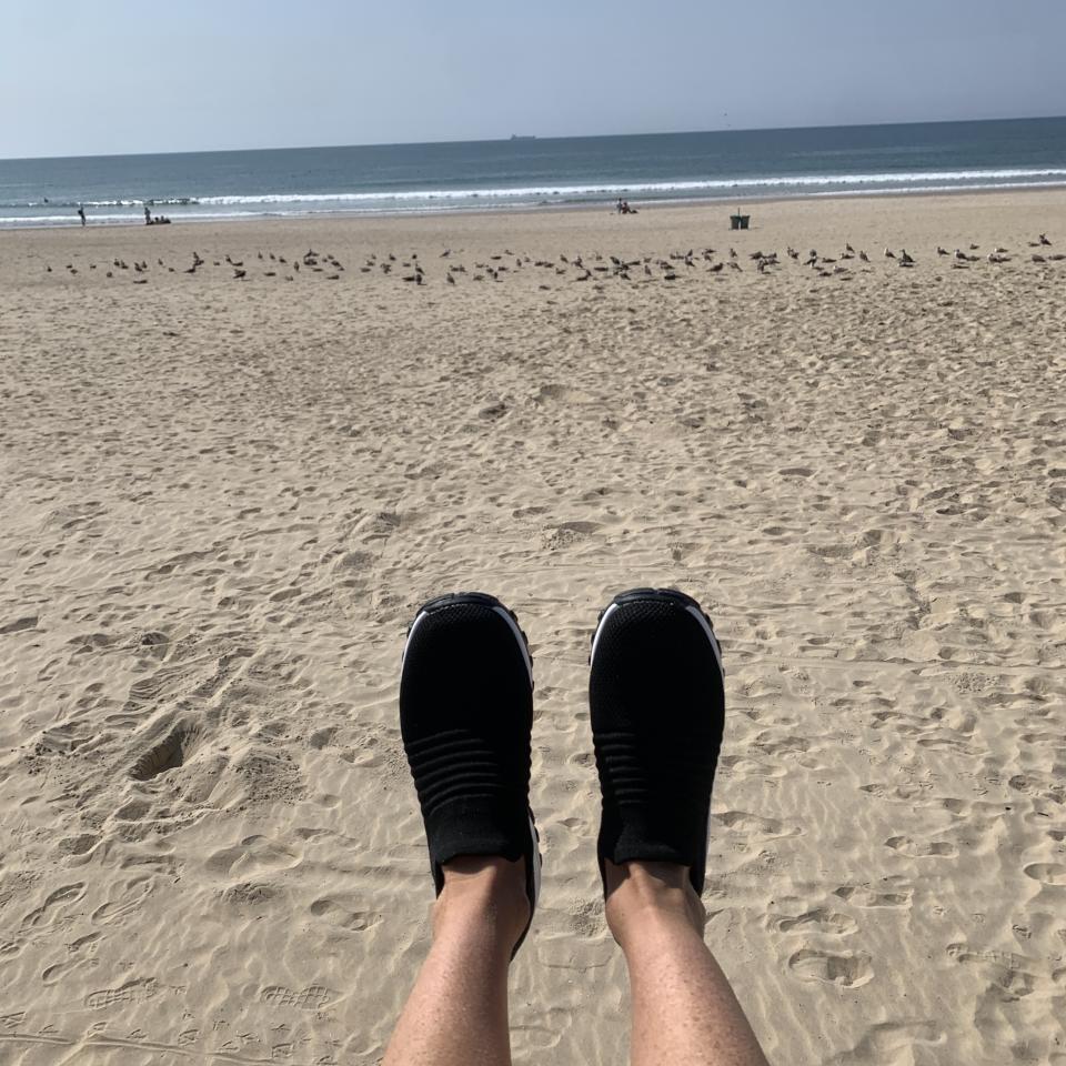wearing my mesh slip-on shoes at Matosinhos Beach just outside of Porto (Katie Jackson / TODAY)