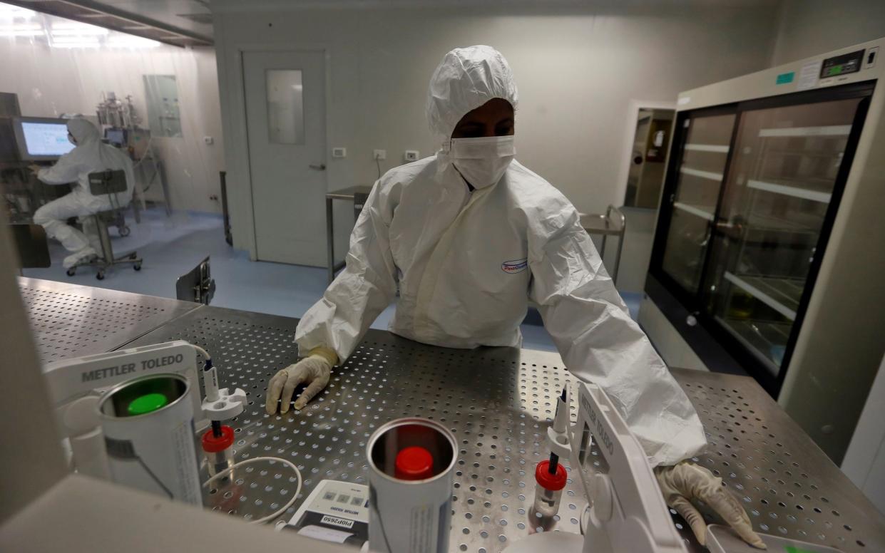 High-risk laboratory workers process Cuban vaccines against Covid-19, in Havana, Cuba