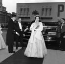 <p>The monarch had a busy summer in 1959, embarking on a <a href="https://www.chicagotribune.com/history/ct-queen-elizabeth-chicago-visit-htmlstory.html" rel="nofollow noopener" target="_blank" data-ylk="slk:45-day tour" class="link ">45-day tour</a> of Canada and the Great Lakes. Here, she arrives at a ball in Montreal looking stunning in an embroidered dress and plenty of diamonds. </p>