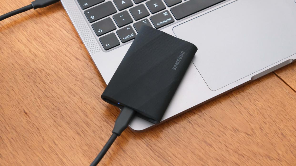 Samsung T9 portable SSD on a MacBook Pro laptop. 