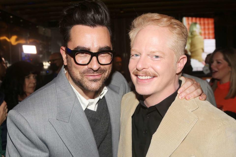 <p>Bruce Glikas/Getty</p> Dan Levy (l.) and Jesse Tyler Ferguson.