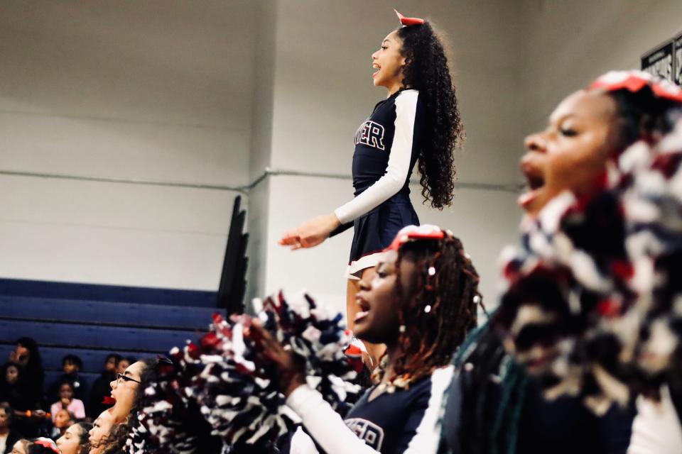 Dwyer cheerleaders get the crowd pumped for the Panthers' 67-59 win over Wellington in Palm Beach Gardens on Jan. 9, 2024.