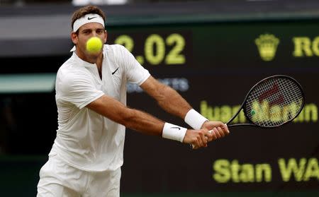 Britain Tennis - Wimbledon - All England Lawn Tennis & Croquet Club, Wimbledon, England - 1/7/16 Argentina's Juan Martin Del Potro in action against Switzerland's Stan Wawrinka REUTERS/Paul Childs