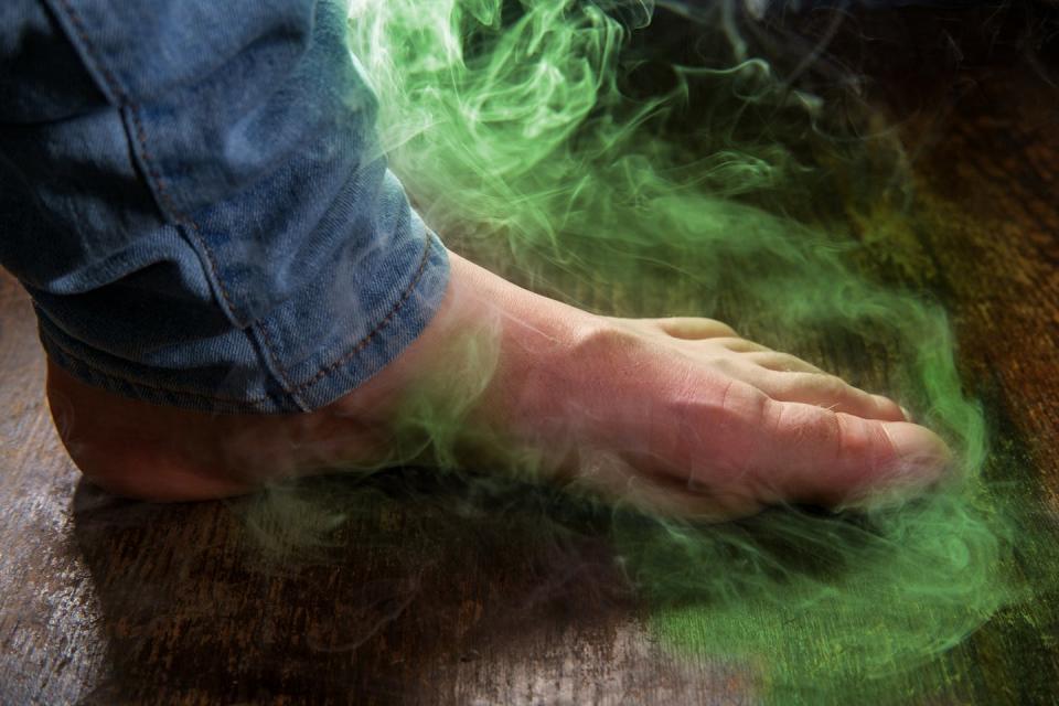 There are ways to cut down on the stink. <a href="https://www.shutterstock.com/image-photo/male-smelly-foot-colorful-visible-odor-1293754405" rel="nofollow noopener" target="_blank" data-ylk="slk:Ezume Images/Shutterstock.com;elm:context_link;itc:0;sec:content-canvas" class="link ">Ezume Images/Shutterstock.com</a>