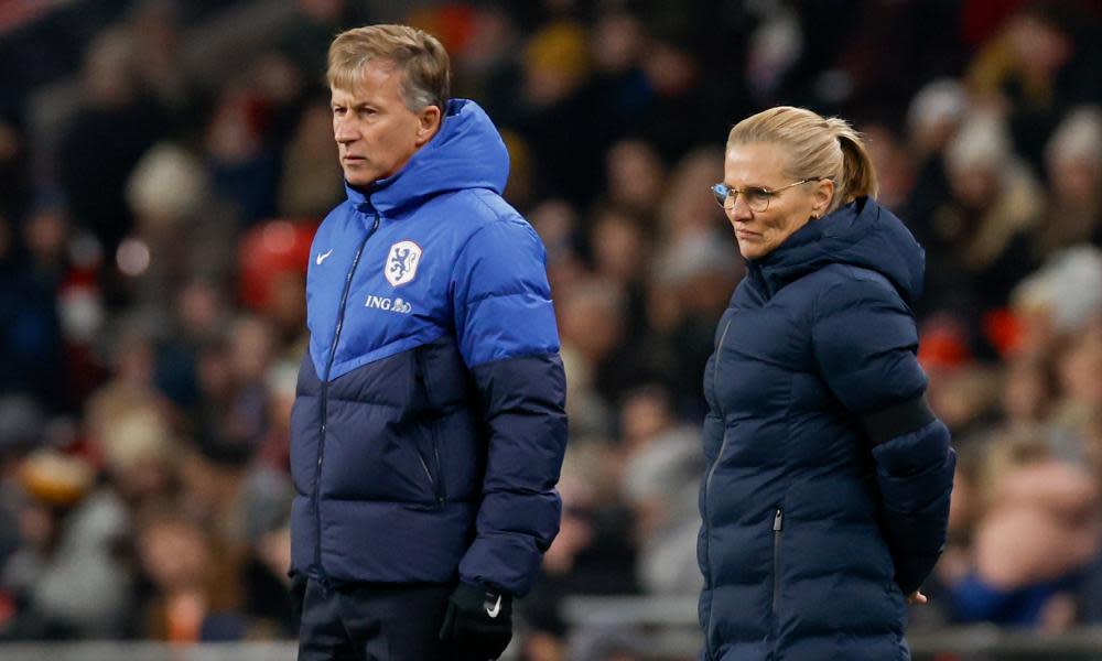 The Netherlands coach, Andries Jonker, on the touchline next to his England counterpart, Sarina Wiegman.