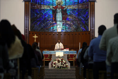 A bishop performs Friday evening mass at Sacred Heart Catholic Church, as Catholics are awaiting a historical visit by Pope Francis to United Arab Emirates, Manama, Bahrain January 18, 2019. . REUTERS/ Hamad I Mohammed