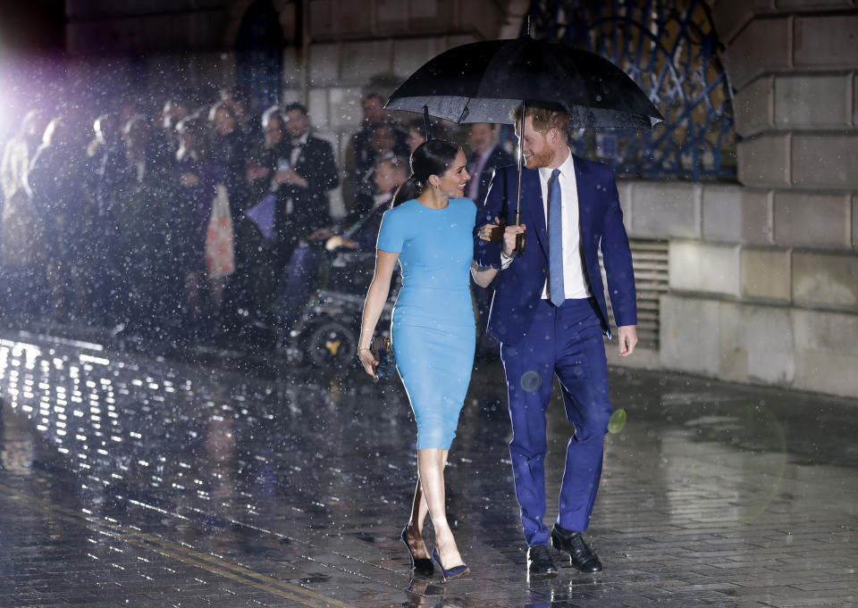 Britain's Prince Harry and Meghan, the Duke and Duchess of Sussex arrive at the annual Endeavour Fund Awards in London, Thursday, March 5, 2020. The awards celebrate the achievements of service personnel who were injured in service and have gone on to use sport as part of their recovery and rehabilitation. (AP Photo/Kirsty Wigglesworth)