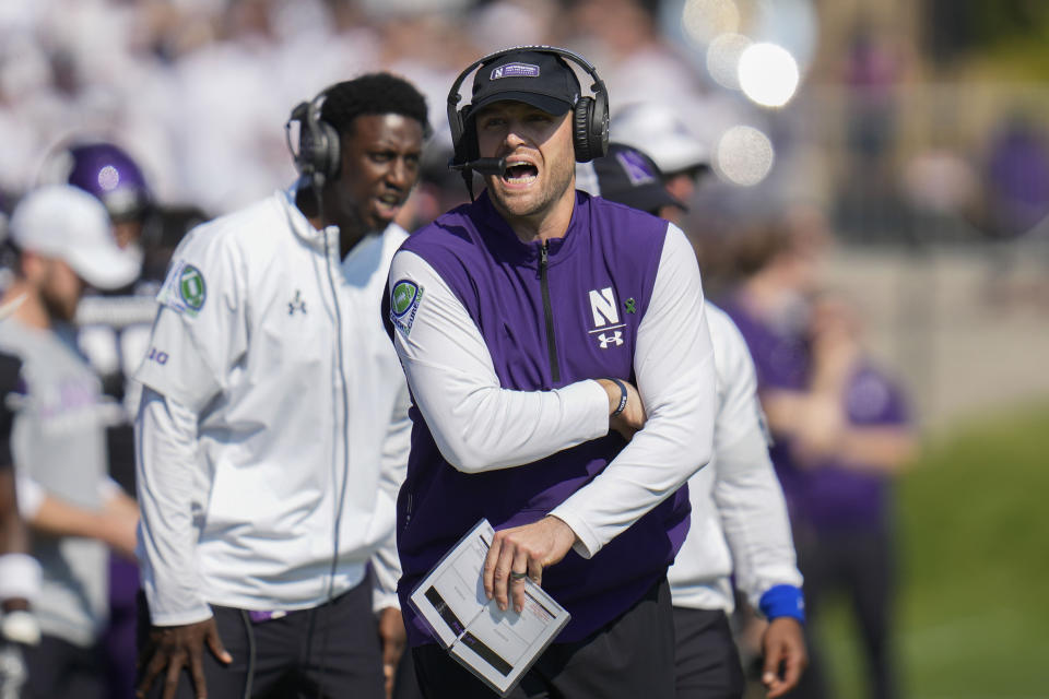 Northwestern interim head coach David Braun yells from the sideline during the first half of an NCAA college football game against Penn State, Saturday, Sept. 30, 2023, in Evanston, Ill. (AP Photo/Erin Hooley)