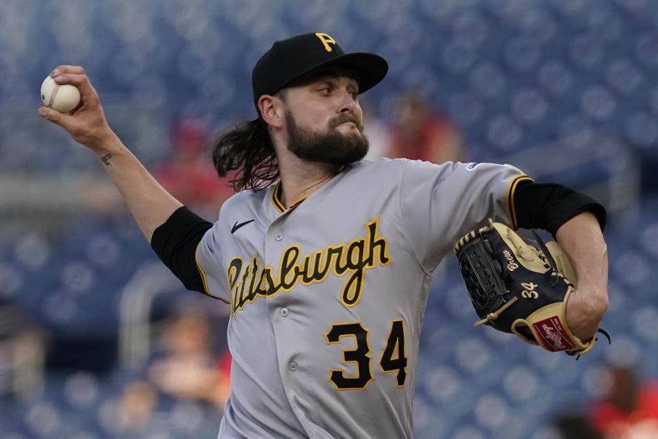 Pittsburgh Pirates starting pitcher JT Brubaker (34) delivers during the first inning of a baseball game against the Washington Nationals, Monday, June 14, 2021, in Washington. (AP Photo/Carolyn Kaster)