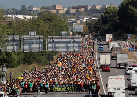 People take part in a protest march in Parets Del Valles