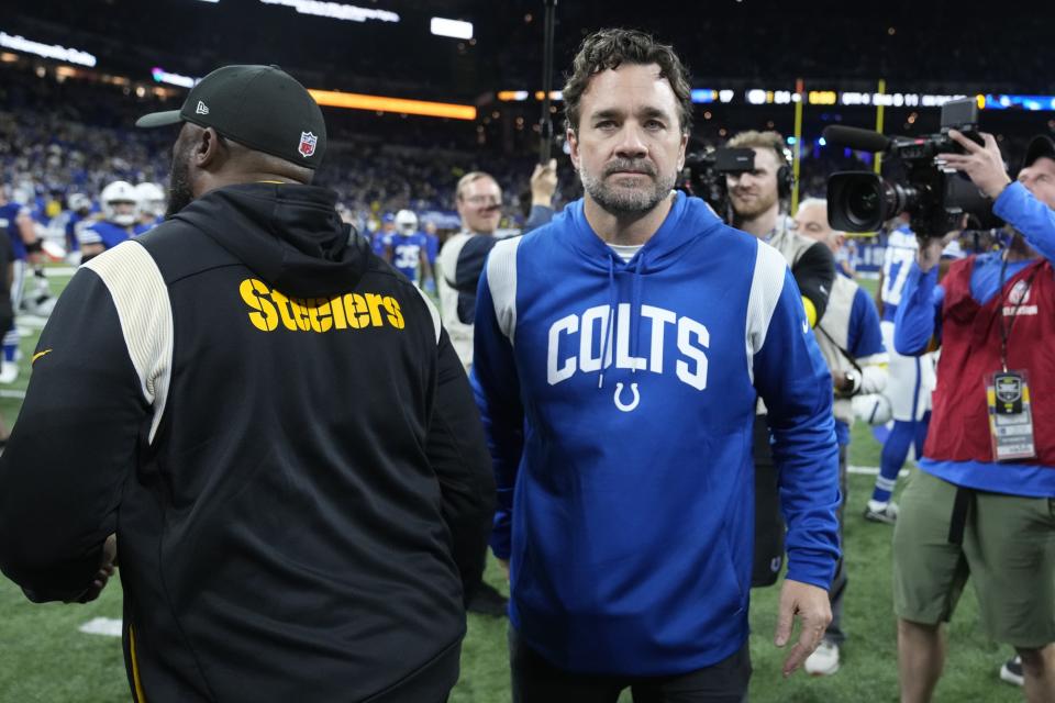 Indianapolis Colts interim head coach Jeff Saturday greets Pittsburgh Steelers head coach Mike Tomlin after the Colts&#39; loss. (AP Photo/Michael Conroy)