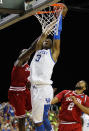 ATLANTA, GA - MARCH 23: Victor Oladipo #4 of the Indiana Hoosiers fouls Terrence Jones #3 of the Kentucky Wildcats in the first half during the 2012 NCAA Men's Basketball South Regional Semifinal game at the Georgia Dome on March 23, 2012 in Atlanta, Georgia. (Photo by Streeter Lecka/Getty Images)