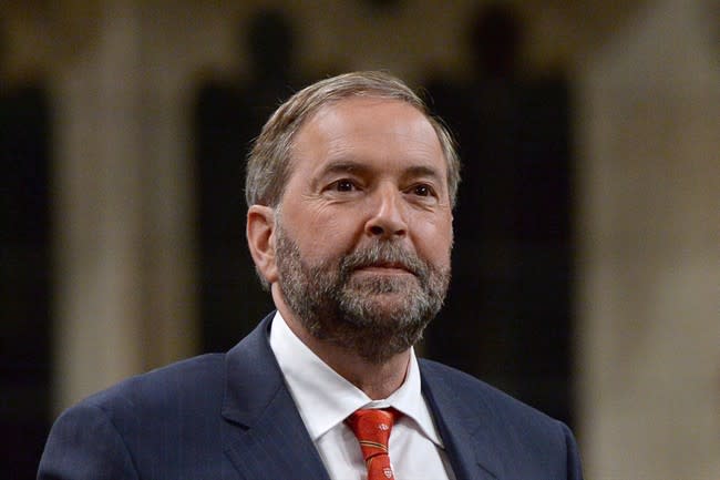 NDP Leader Tom Mulcair asks a question during question period in the House of Commons on Parliament Hill in Ottawa on June 15, 2015. A report published online by Maclean&#39;s magazine says NDP Leader Thomas Mulcair was in discussions in 2007 to join the Conservative party as a senior adviser on the environment to Prime Minister Stephen Harper. THE CANADIAN PRESS/Sean Kilpatrick