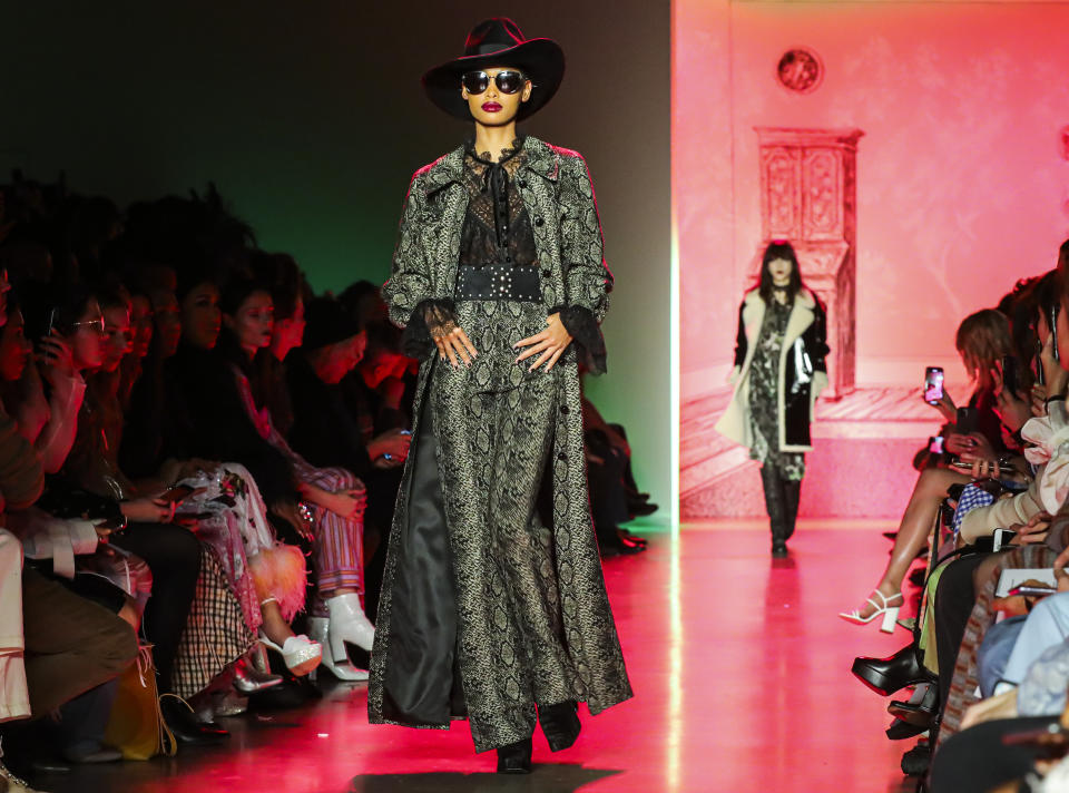 The latest fashion creation from Anna Sui is modeled during New York's Fashion Week, Monday Feb. 10, 2020. (AP Photo/Bebeto Matthews)