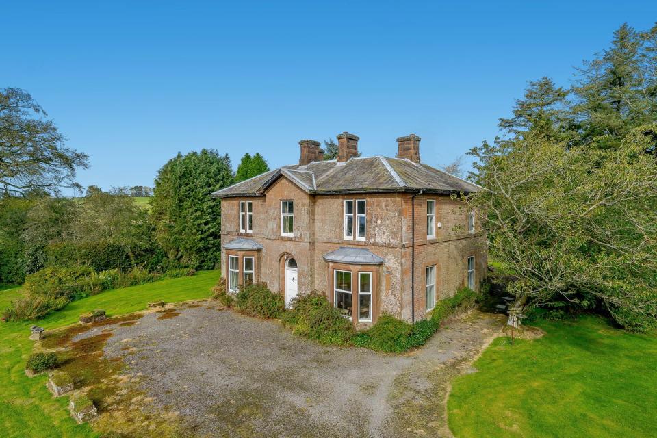 <p>In the heart of the Scottish countryside, this historical grand period home has four bedrooms, three reception rooms and three bathrooms. It might be in need of a little TLC, but it's incredibly spacious both inside and out. </p><p><a href="https://www.onthemarket.com/details/9565819/" rel="nofollow noopener" target="_blank" data-ylk="slk:This property is currently on the market for £445,000 with Strutt & Parker at OnTheMarket;elm:context_link;itc:0;sec:content-canvas" class="link ">This property is currently on the market for £445,000 with Strutt & Parker at OnTheMarket</a></p>