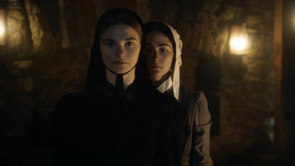 A still from The Last Thing Mary Saw shows Mary and Isabelle two young women in 1800s New York standing in the dark