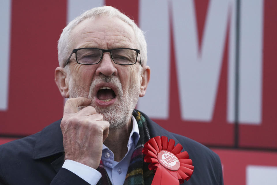 Labour Party leader Jeremy Corbyn gestures, at a rally in Stainton Village, on the last day of General Election campaigning, in Middlesbrough, England, Wednesday, Dec. 11, 2019. Britain goes to the polls on Dec. 12. (Owen Humphreys/PA via AP)