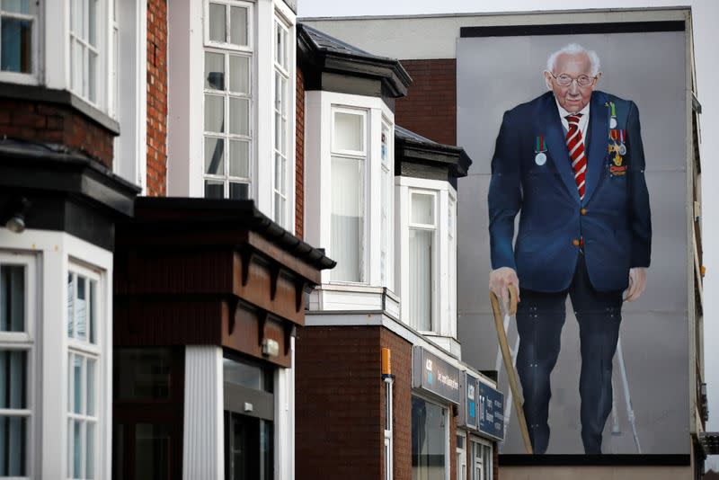 A mural of Captain Sir Tom Moore is seen on a building in Southport