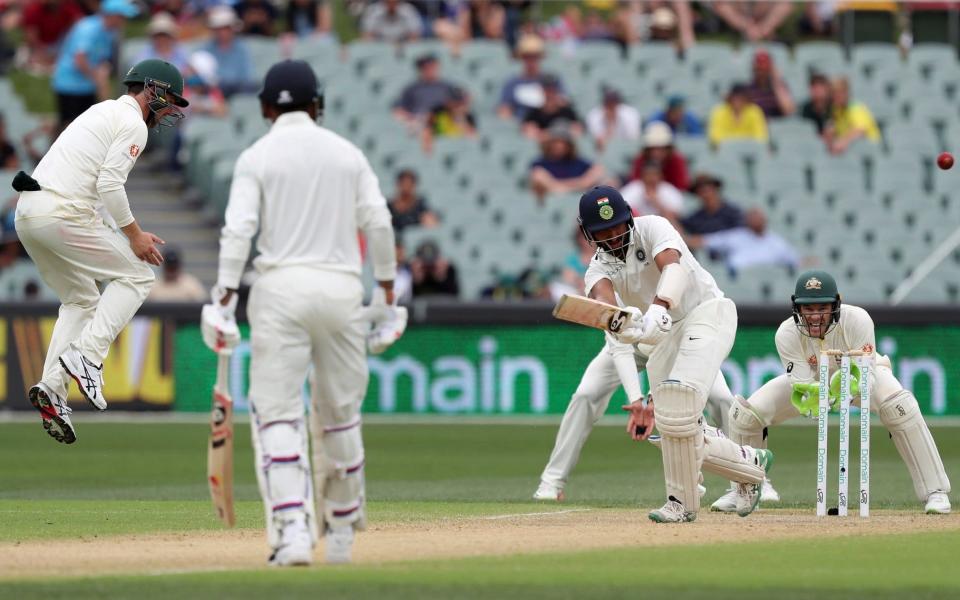 First-innings century maker Cheteshwar Pujara again blunted Australia's attack to put India in a strong position after a rain-interrupted third day of the first Test.