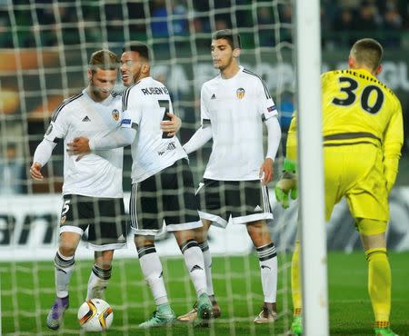 Football - Rapid Wien v Valencia - UEFA Europa League round of 32 - Group G - Ernst Happel Stadium, Vienna, Austria - 25/02/16 Valencia's players celebrate after scoring a goal REUTERS/Heinz-Peter Bader