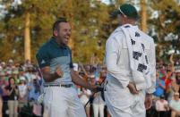 Sergio Garcia of Spain celebrates winning the Masters with caddie Glenn Murray during a playoff against Justin Rose of England in the final round of the 2017 Masters golf tournament at Augusta National Golf Club in Augusta, Georgia, U.S., April 9, 2017. REUTERS/Mike Segar