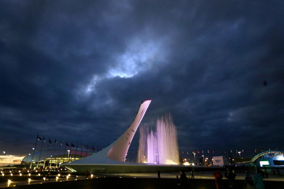 A testing of a water light show is conducted at the Olympic cauldron at the 2014 Winter Olympics, Saturday, Feb. 1, 2014, in Sochi, Russia. (AP Photo/David Goldman)