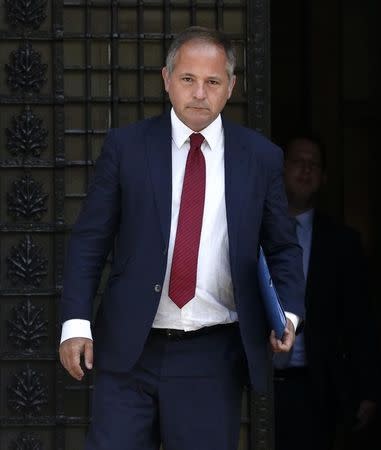 European Central Bank Executive Board member Benoit Coeure leaves after a meeting with Greece's Prime Minister Antonis Samaras (not pictured) in Athens August 28, 2014. REUTERS/Alkis Konstantinidis