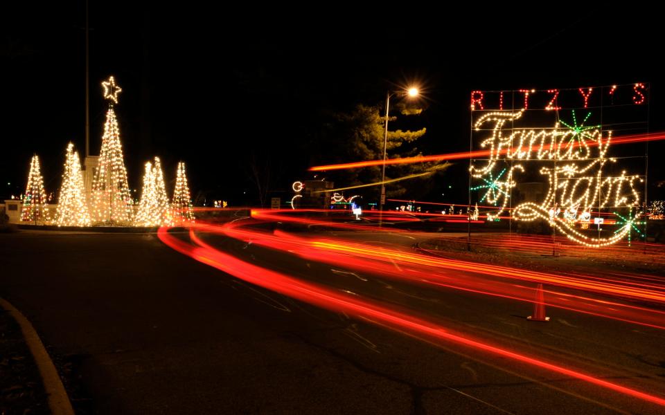 Visitors taillights become blurs of light in this time exposure of the Ritzy's Fantasy of Lights in Garvin Park. The light display, which raised more than $145,000 last year for Easter Seals, will remain up through Jan. 1, New Years night.