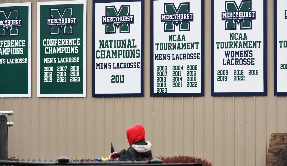 A spectator arrives to watch the Mercyhurst University women's lacrosse team host PennWest Edinboro University in Erie on April 3. Mercyhurst University’s athletic program is moving up to the Division I level starting this fall as a member of the Northeast Conference.