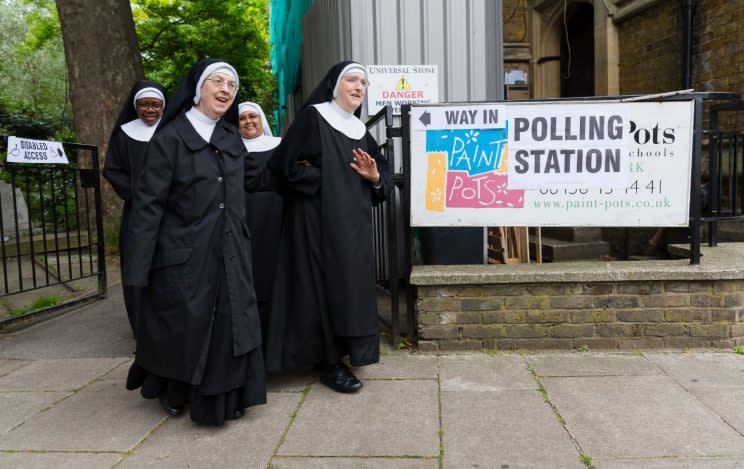Job done: Nuns pictured outside the polling station at St John's Hyde Park, London (Rex) 