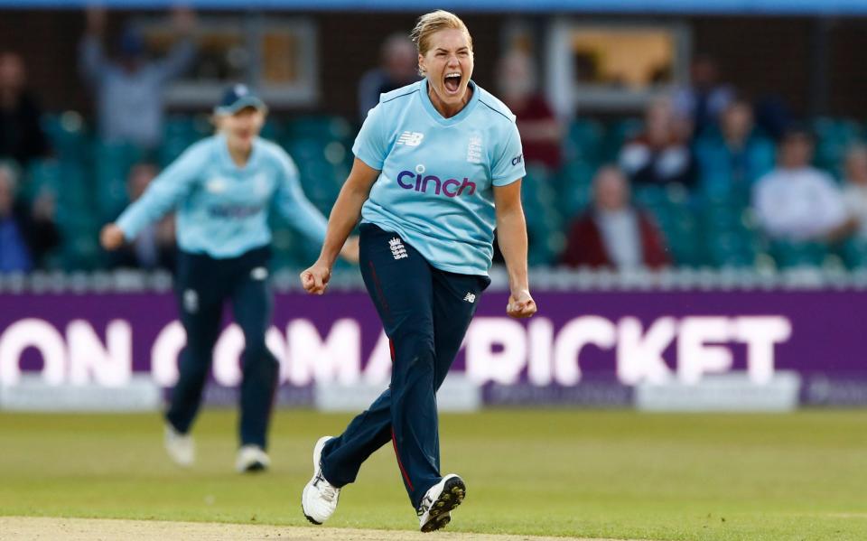 Katherine Brunt celebrates after taking the wicket of New Zealand's Sophie Devine. - REUTERS