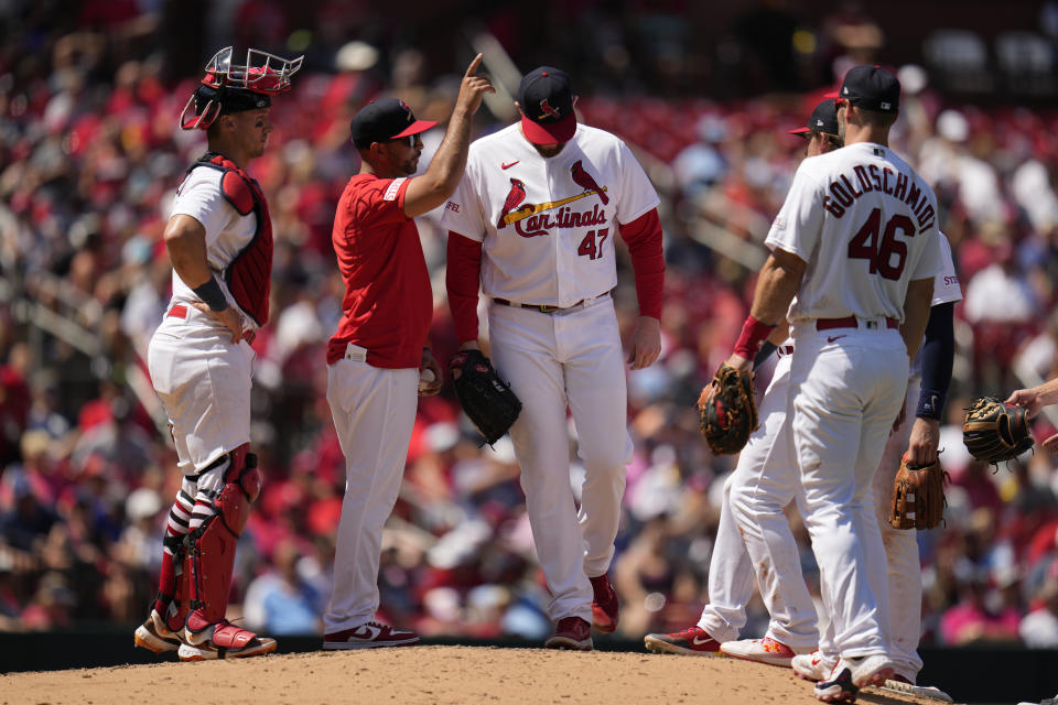 St. Louis Cardinals starting pitcher Jordan Montgomery (47) is removed by manager Oliver Marmol, second from left, during the seventh inning of a baseball game Sunday, July 2, 2023, in St. Louis. (AP Photo/Jeff Roberson)